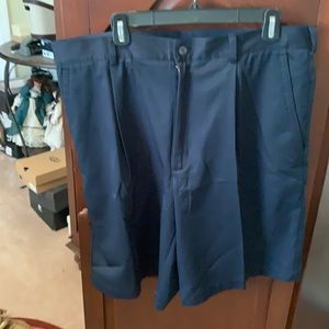 Men’s navy blue Nike Dry Fit men’s golf shorts.